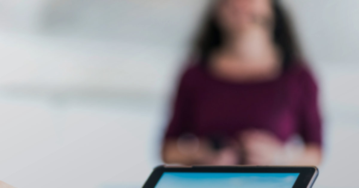 A modern digital open house sign-in sheet on a tablet, replacing paper sign-in sheets.