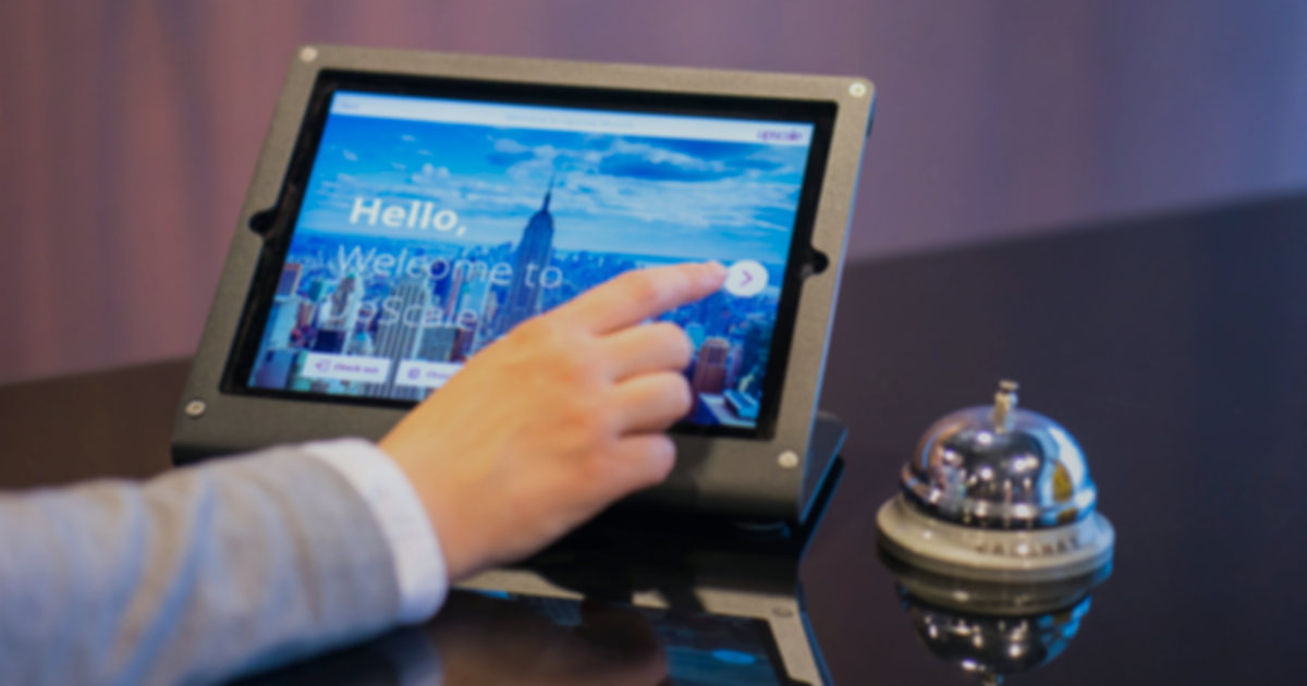 A tablet-based open house check-in system used for visitor registration.